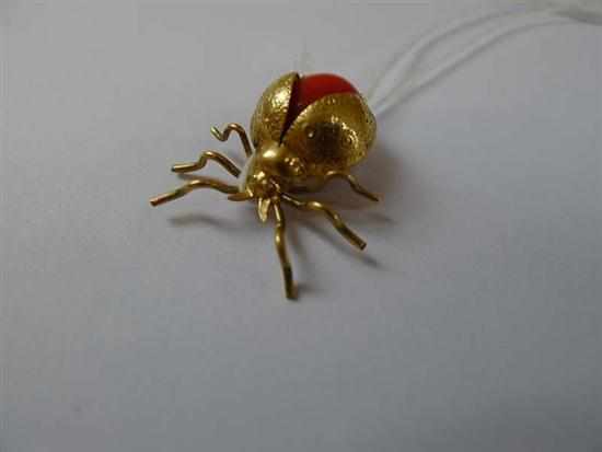 Appraisal: A CORAL SET LADY BIRD BROOCH IN CT GOLD