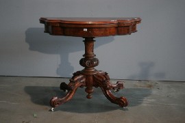 Appraisal: A Victorian walnut card table