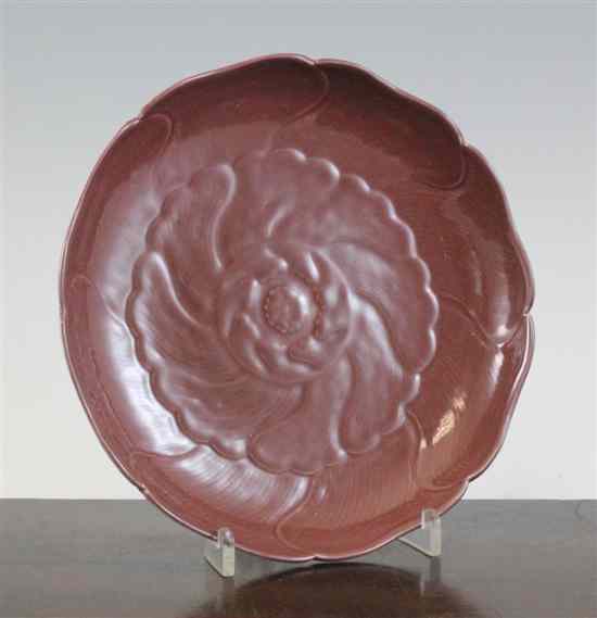 Appraisal: A Chinese aubergine glazed lotus flower moulded dish Yongzheng mark