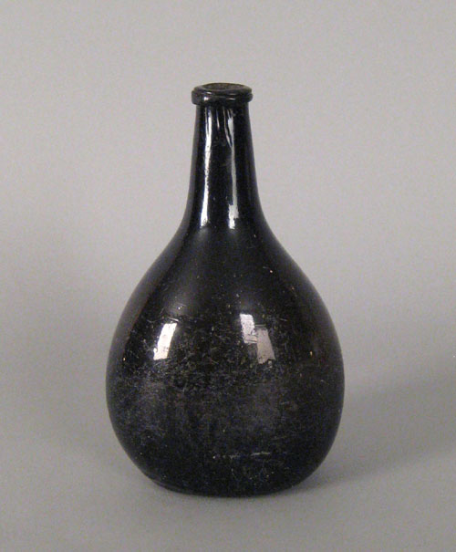 Appraisal: American blown olive glass bottle th c h