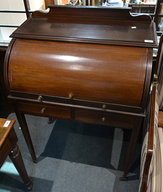 Appraisal: An Edwardian mahogany and inlaid cylinder bureauon tapering supports cm