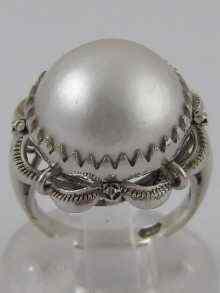 Appraisal: A white metal tests carat gold cultured pearl ring the