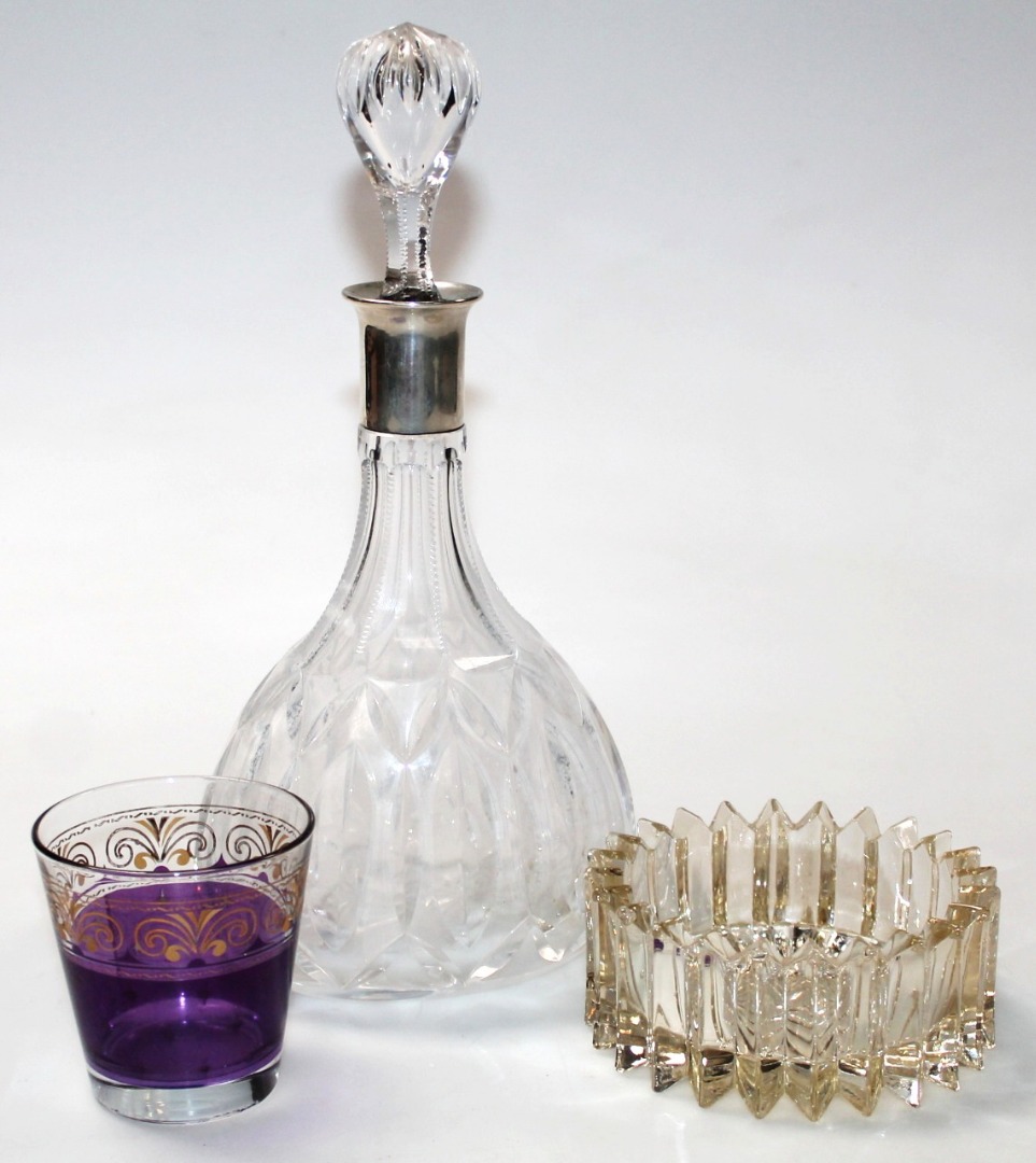 Appraisal: A thC Continental decanter with shaped stopper and white metal