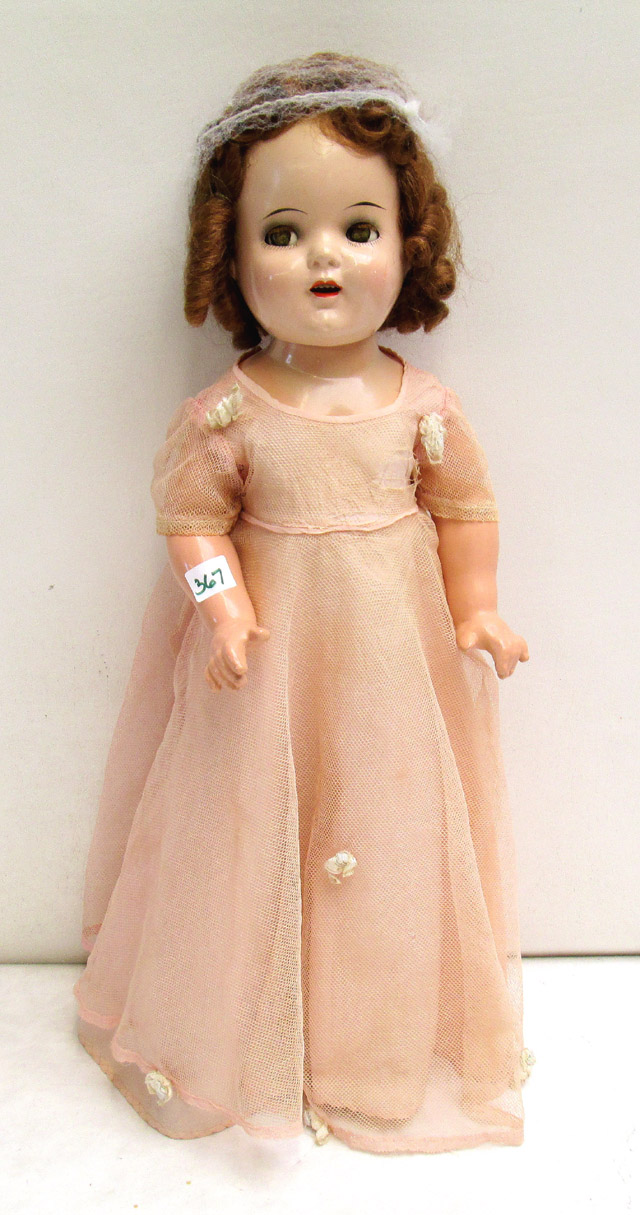 Appraisal: SHIRLEY TEMPLE CINDERELLA DOLL having composition shoulder head with brown