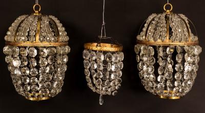 Appraisal: A pair of gilt metal pendant ceiling lights hung trails