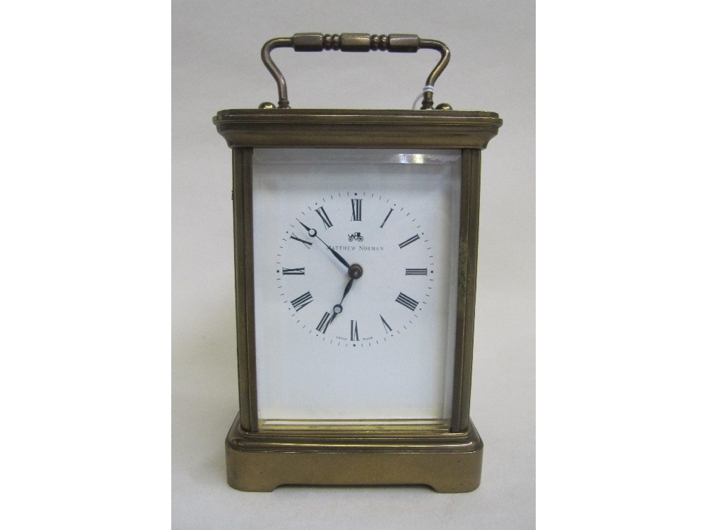 Appraisal: Matthew Norman brass cased carriage clock with white enamel dial