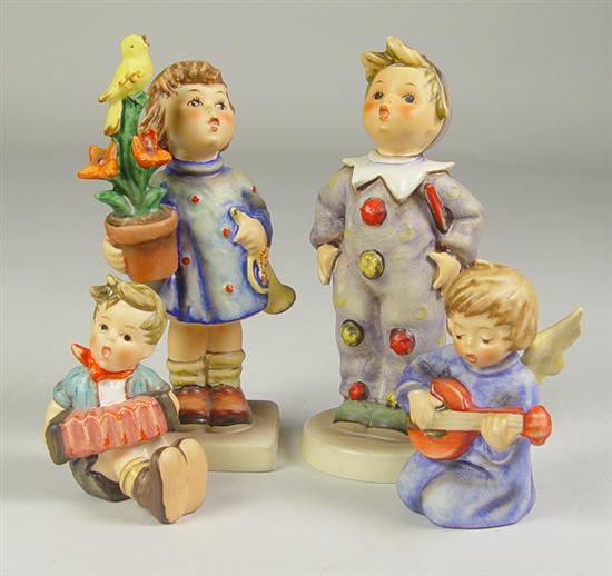 Appraisal: Four Hummel Figurines Congratulations mold - trademark high Carnival mold