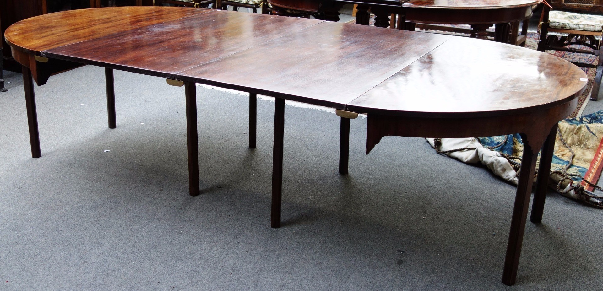 Appraisal: A George III mahogany 'D' end dining table on eight