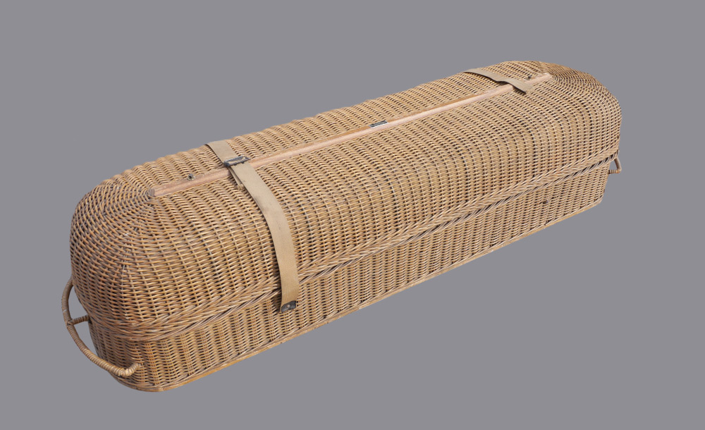 Appraisal: UNDERTAKER'S SUPPLY WICKER BODY CARRIER part reed wicker coffin body