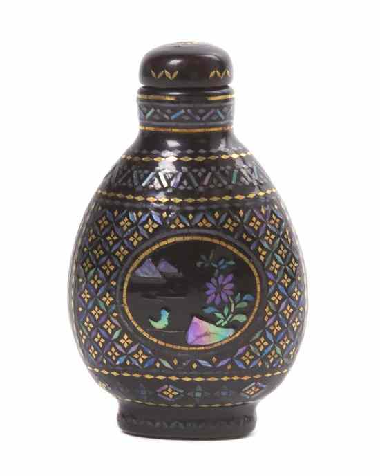 Appraisal: A Lac Burgaute Snuff Bottle of ovoid form having oval