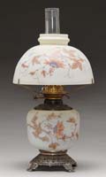 Appraisal: DECORATED MILK GLASS KEROSENE TABLE LAMP Font holder and shade