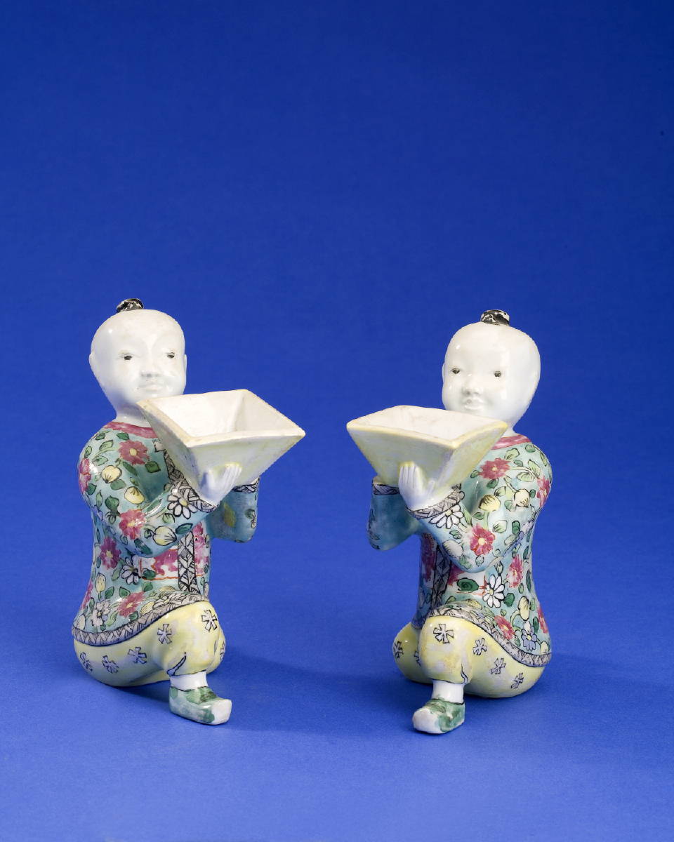 Appraisal: PAIR OF CHINESE EXPORT PORCELAIN FAMILLE VERTE FIGURES OF BOYS