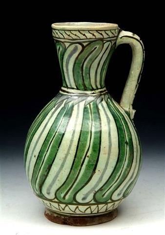 Appraisal: A TURKISH IZNIK FAIENCE STRIPED JUG circa of baluster form