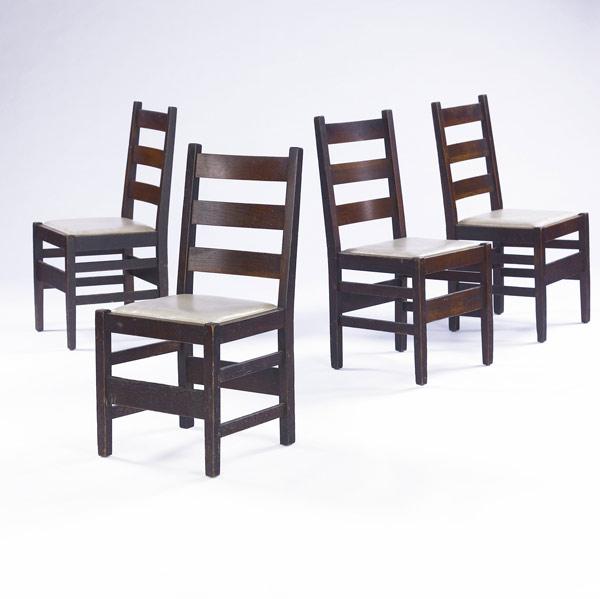 Appraisal: GUSTAV STICKLEY Four ladderback dining chairs no with drop-in seats