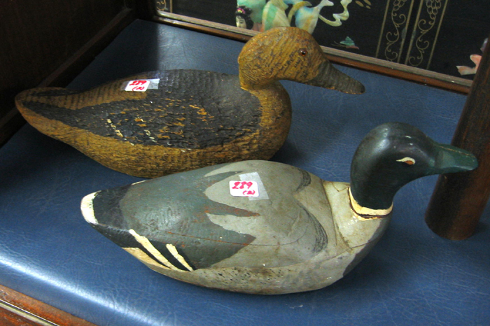 Appraisal: TWO WOOD CARVED DUCK DECOYS a stylized mallard drake and