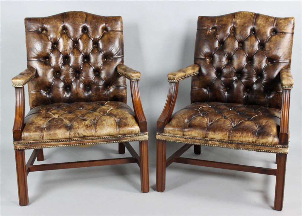 Appraisal: PAIR OF GEORGIAN STYLE TUFTED BROWN LEATHER OPEN ARM LIBRARY