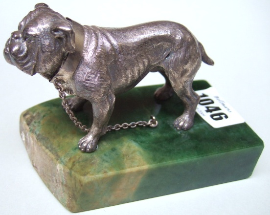 Appraisal: A silver model of a standing bulldog wearing a collar