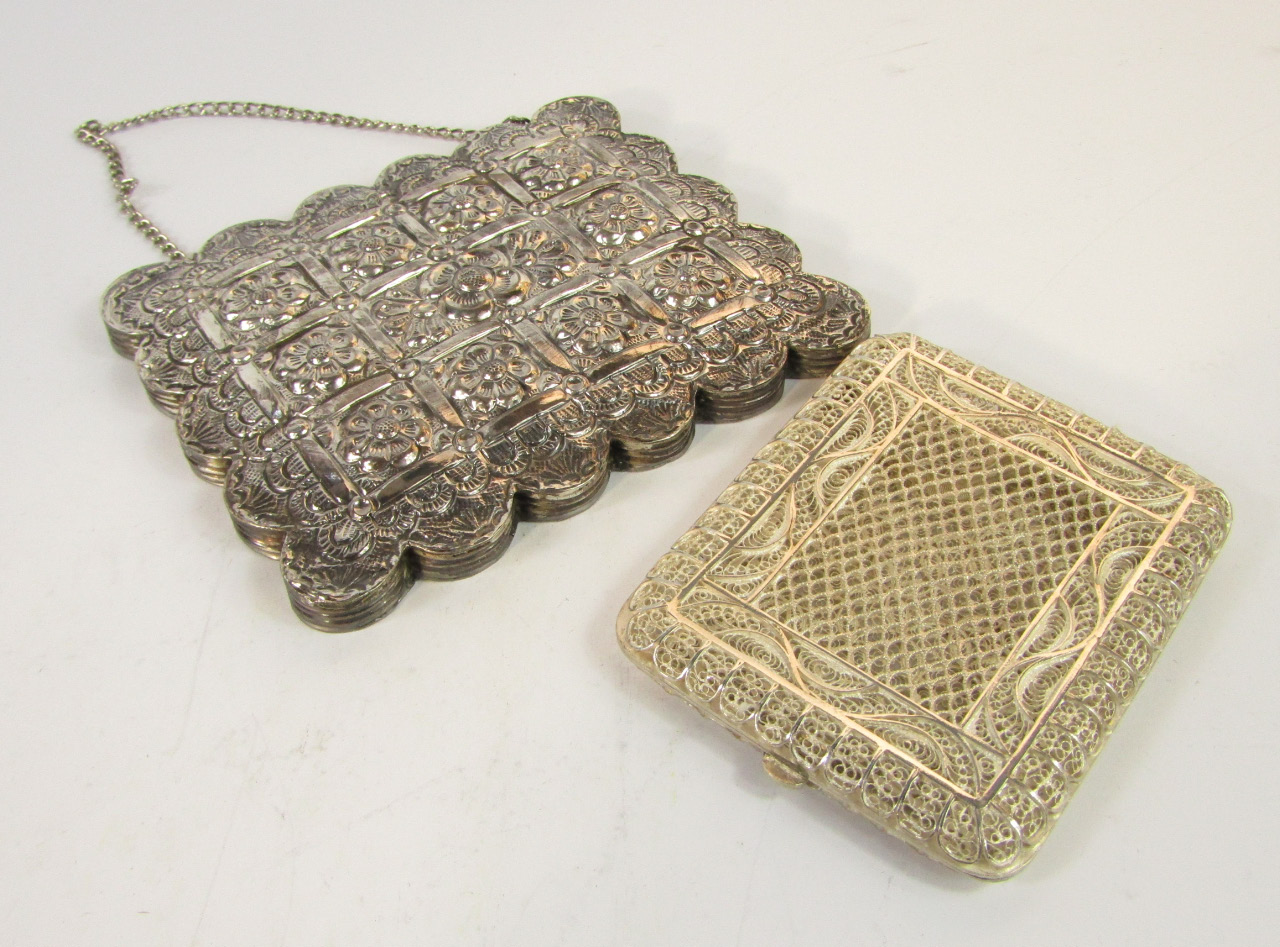 Appraisal: An Indian white metal filigree cigarette case cm x cm