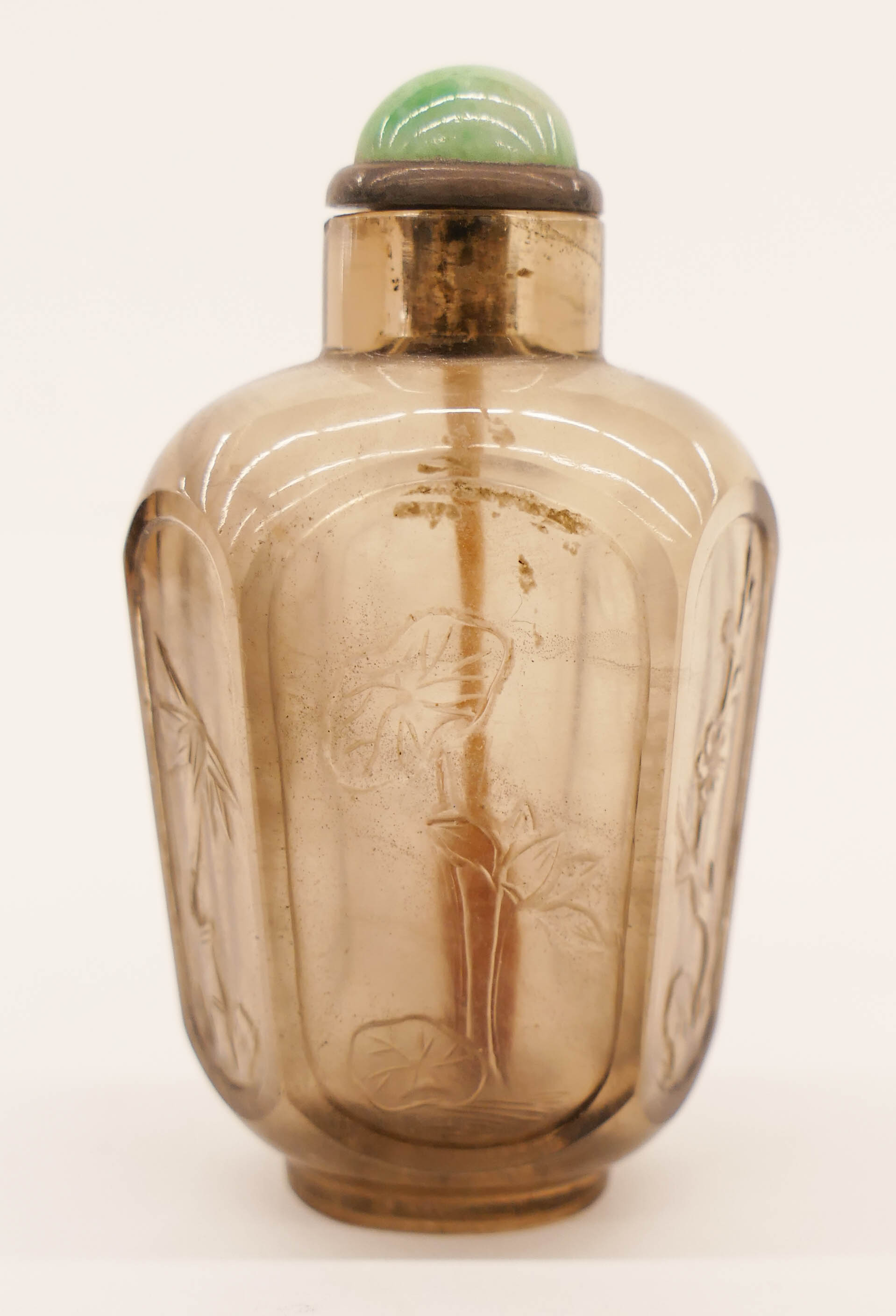 Appraisal: Chinese Qing Smokey Quartz Snuff Bottle '' Relief carved with