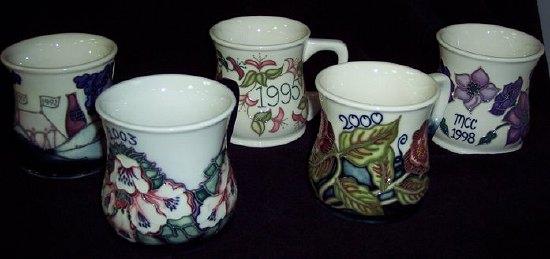 Appraisal: Five Moorcroft mugs dated M C C and M C