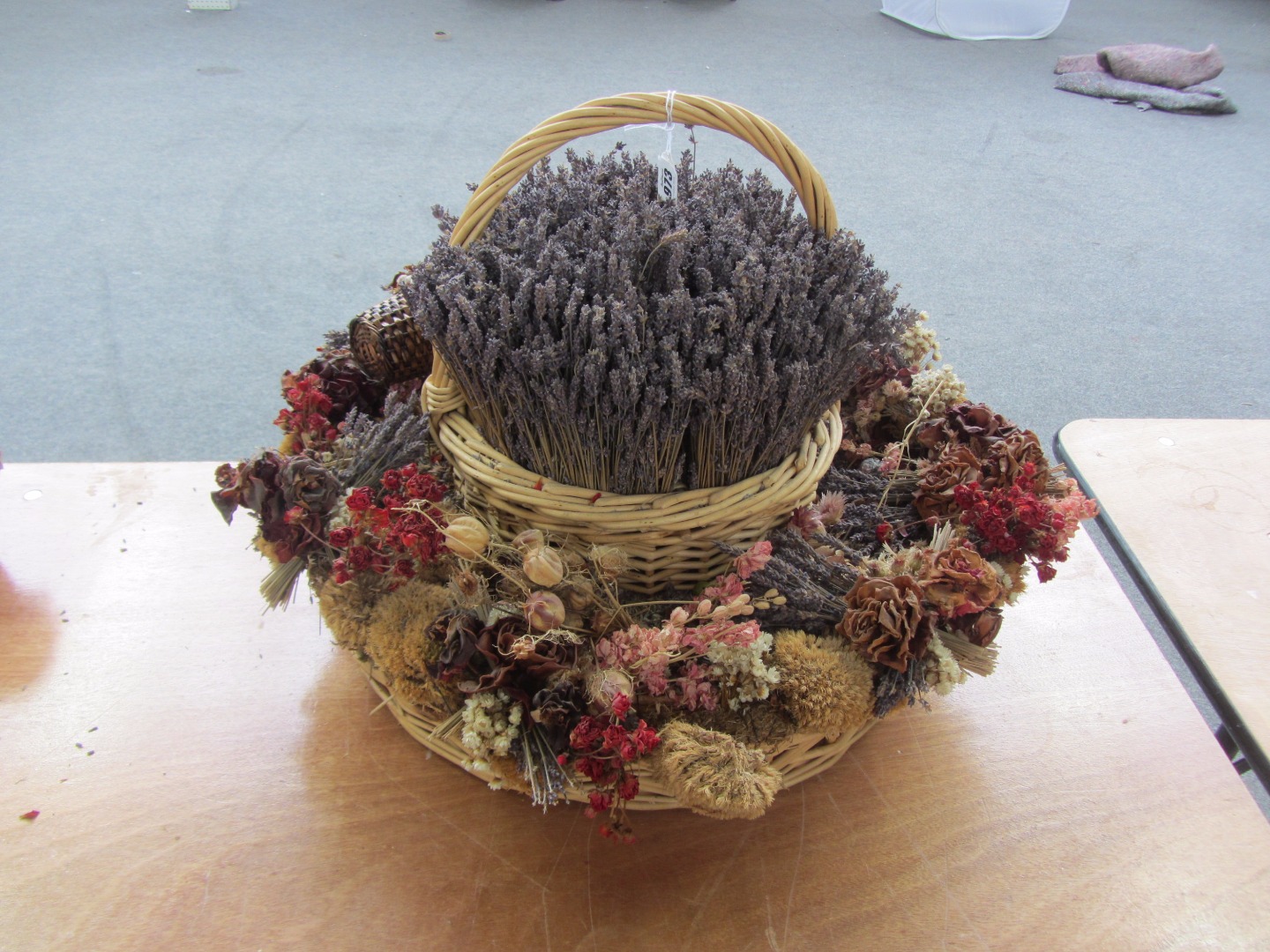 Appraisal: A two tier wicker basket of circular form decorated with