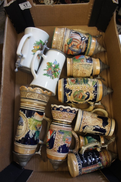 Appraisal: A Collection of Various German Embossed Porcelain Beer Steins with