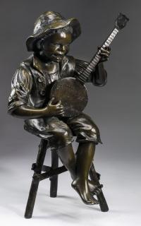 Appraisal: Bronze sculpture boy with banjo h Patinated bronze sculpture depicting