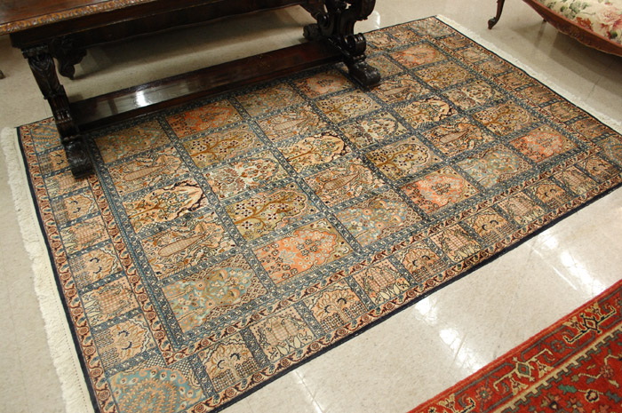 Appraisal: HAND KNOTTED ORIENTAL PANEL CARPET Indo-Persian faux silk repeating flower-filled