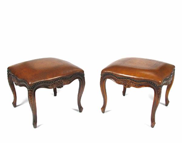 Appraisal: A pair of Louis XV style leather seat stools height