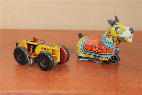 Appraisal: TWO TIN WIND UP TOYS Both lithographed Marx toys A