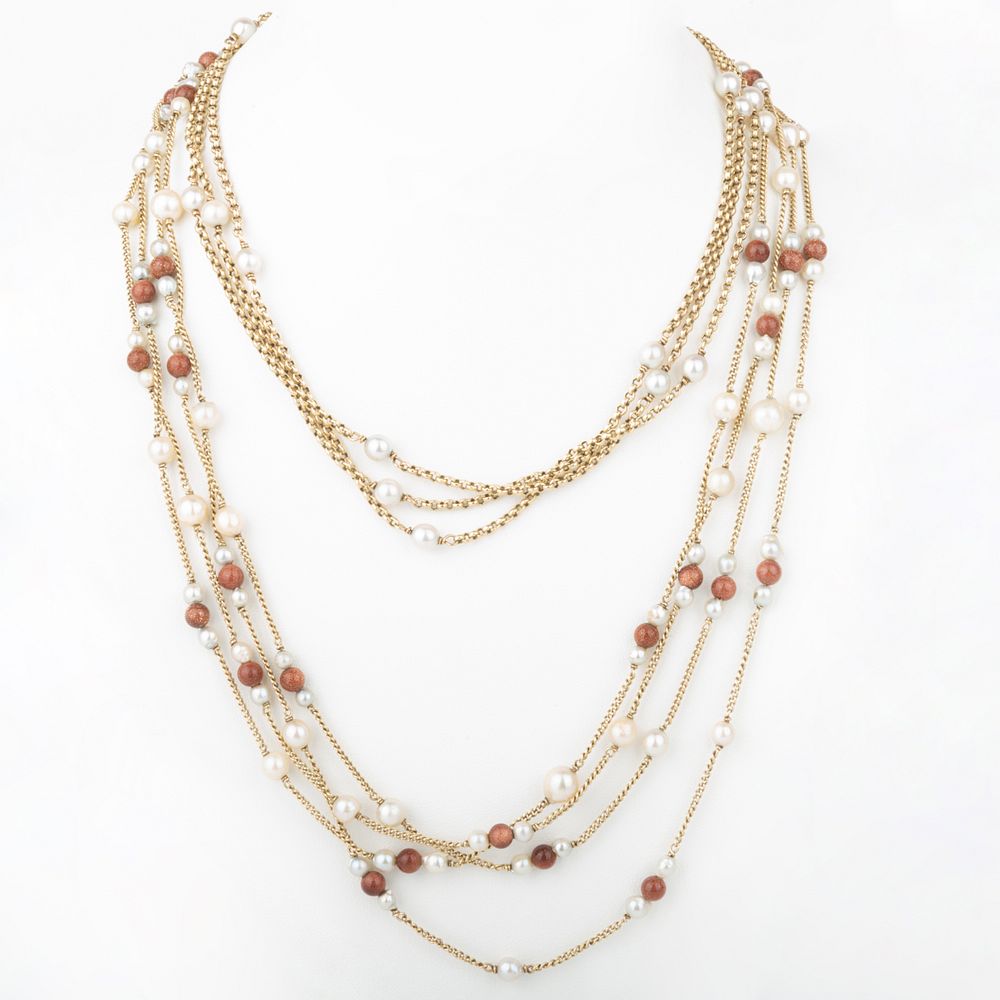 Appraisal: Two Long k Gold and Pearl Beaded Necklaces One with