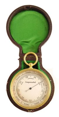 Appraisal: A gilt brass pocket aneroid barometer and compass with a