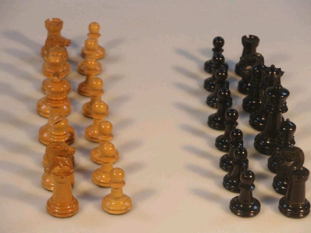 Appraisal: A boxwood and ebony Staunton pattern chess set the King