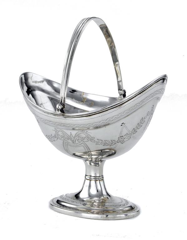 Appraisal: AN IRISH GEORGE III BRIGHT CUT NAVETTE SHAPED SUGAR BASKET