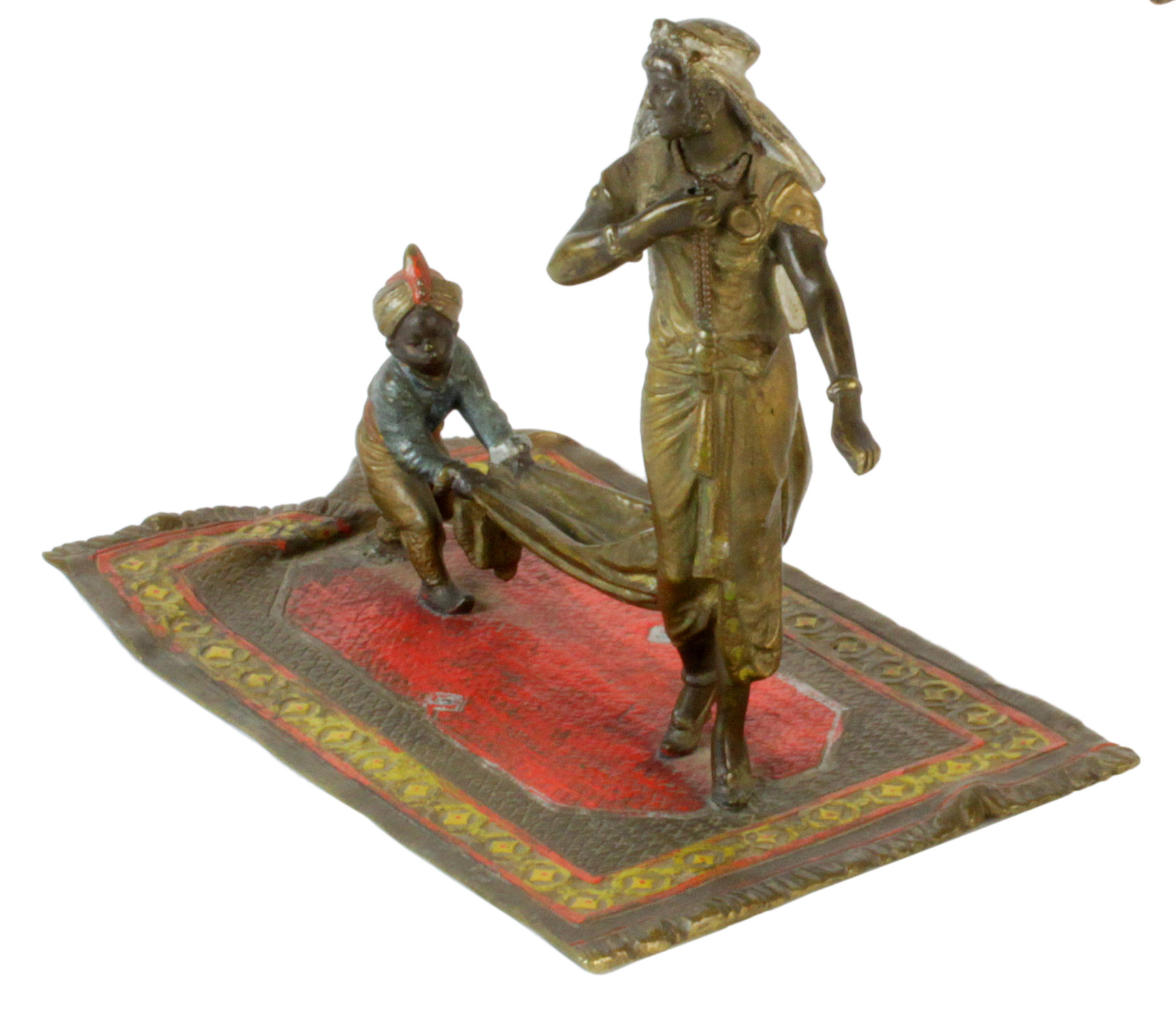 Appraisal: An Austrian cold painted bronze figure group depicting a finely