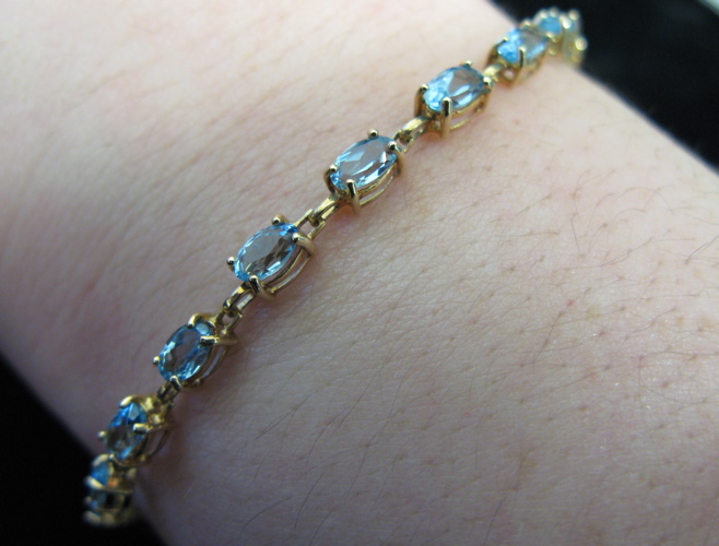 Appraisal: BLUE TOPAZ AND TEN KARAT GOLD BRACELET - inches in