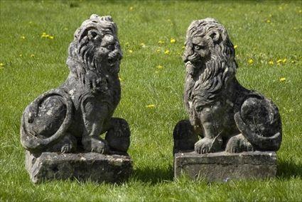 Appraisal: PAIR OF LIMESTONE LIONS in tall Christie's lot Provenance Chateau