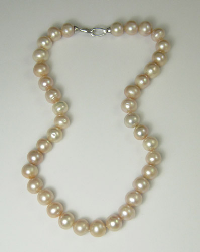 Appraisal: PRINCESS LENGTH PINK PEARL NECKLACE measuring - inches in length