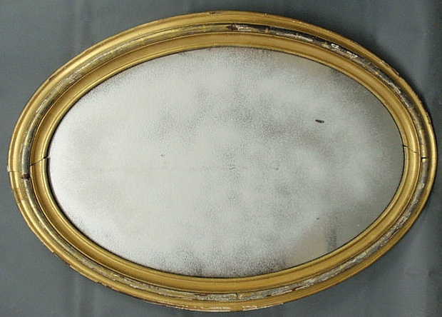 Appraisal: Large oval gilt framed mirror As found h x w