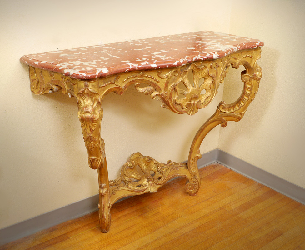 Appraisal: ROCOCO STYLE CONTINENTAL CARVED GILT WOOD FOYER TABLE Shaped variegated