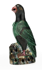 Appraisal: Chinese ceramic parrot Qing dynasty green glazed biscuit figure standing