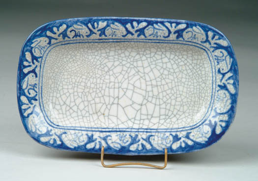 Appraisal: DEDHAM POTTERY CELERY TRAY WITH RABBIT DECORATION Rectangular shape Blue