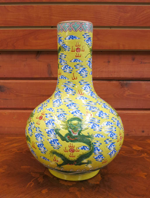 Appraisal: CHINESE QING PORCELAIN VASE bottle form with six dragons chasing