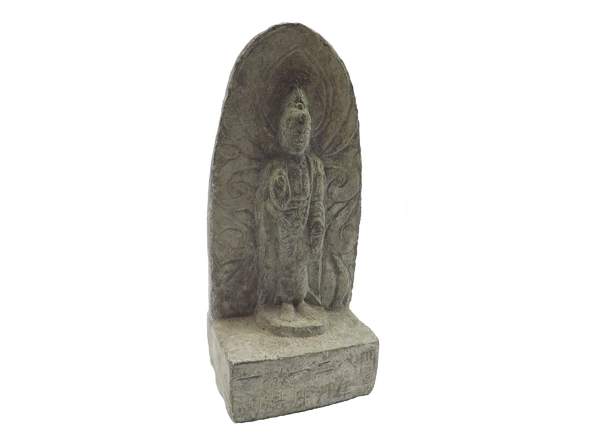 Appraisal: Oriental carved stone deity standing against a rounded lotus shaped