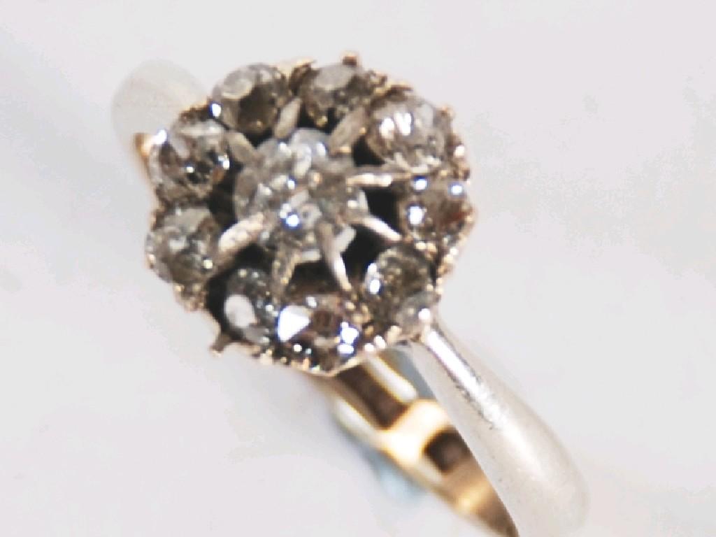 Appraisal: ct WHITE GOLD AND DIAMOND CLUSTER RING set with a