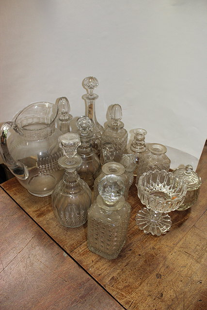 Appraisal: A LARGE GLASS JUG together with various decanters sweetmeat jar