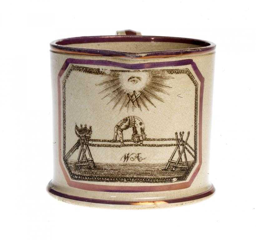 Appraisal: AN UNUSUAL PINK LUSTRE EARTHENWARE MUG with sepia transfer print