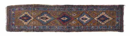 Appraisal: A Sarab Wool Runner having five diamond form medallions on