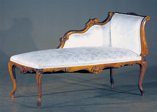 Appraisal: Louis XV style carved fruitwood chaise lounge scrolling upholstered back