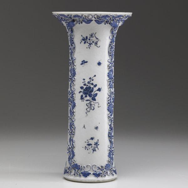 Appraisal: CHINESE EXPORT Blue and white vase with relief vine decoration